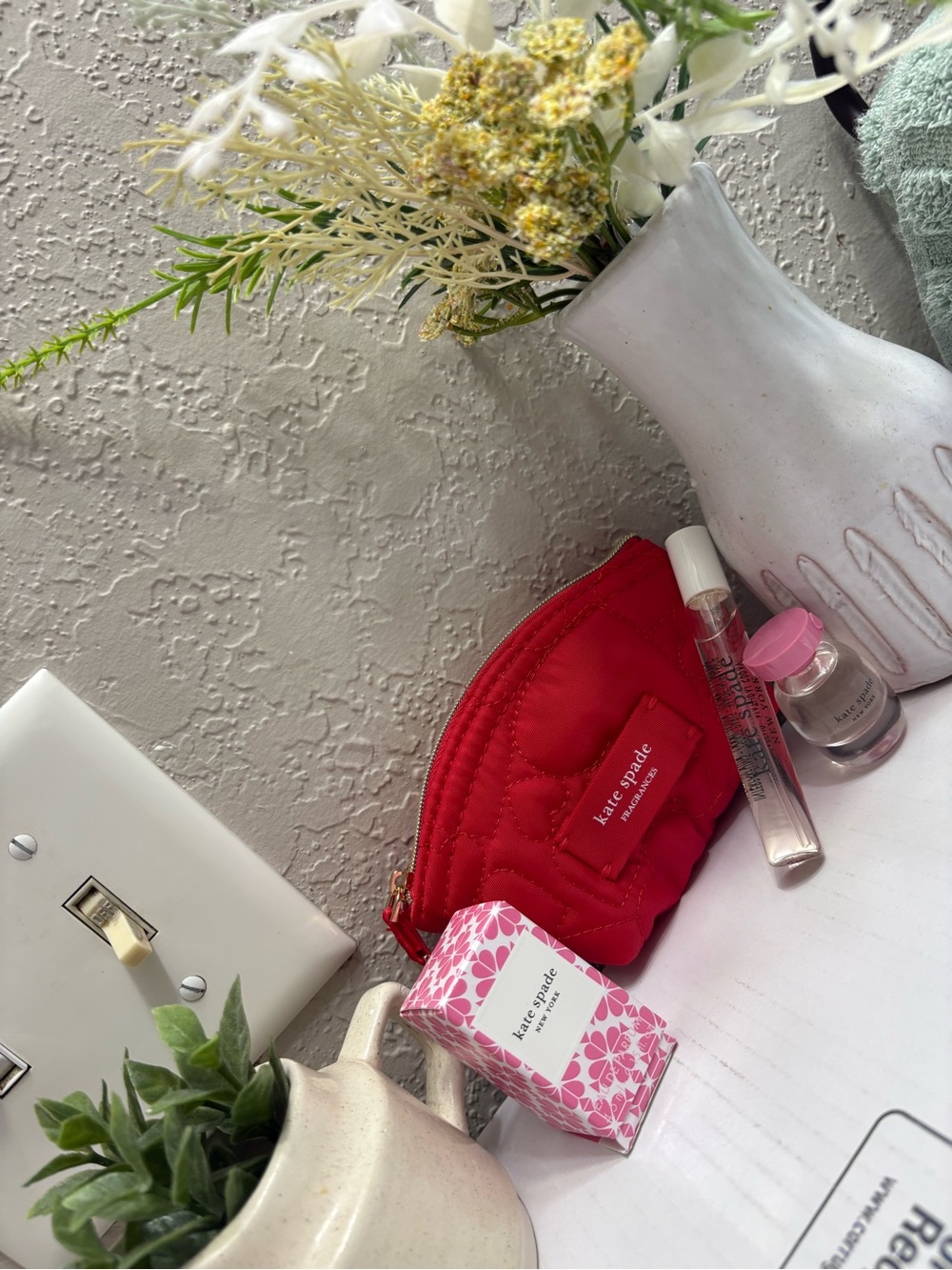kate spade Red Quilted Mini Cosmetic Pouch with mini perfumes